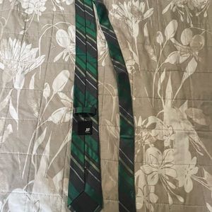 Charcoal necktie with green stripes